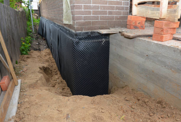 SJ Waterproofing Pros technician performing targeted Foundation Crack Repair assessment in Woodville, WI